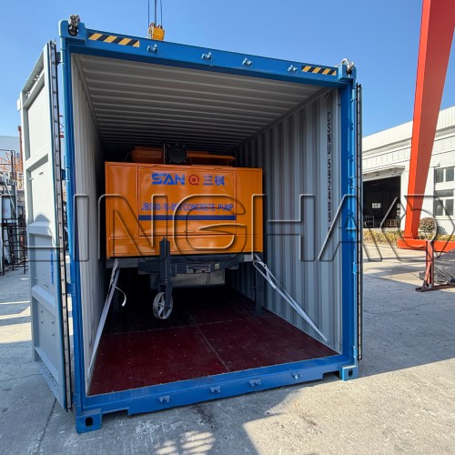 Indian customer unpacking and inspecting the JBT40 concrete mixing pump upon arrival at port on February 8, 2026